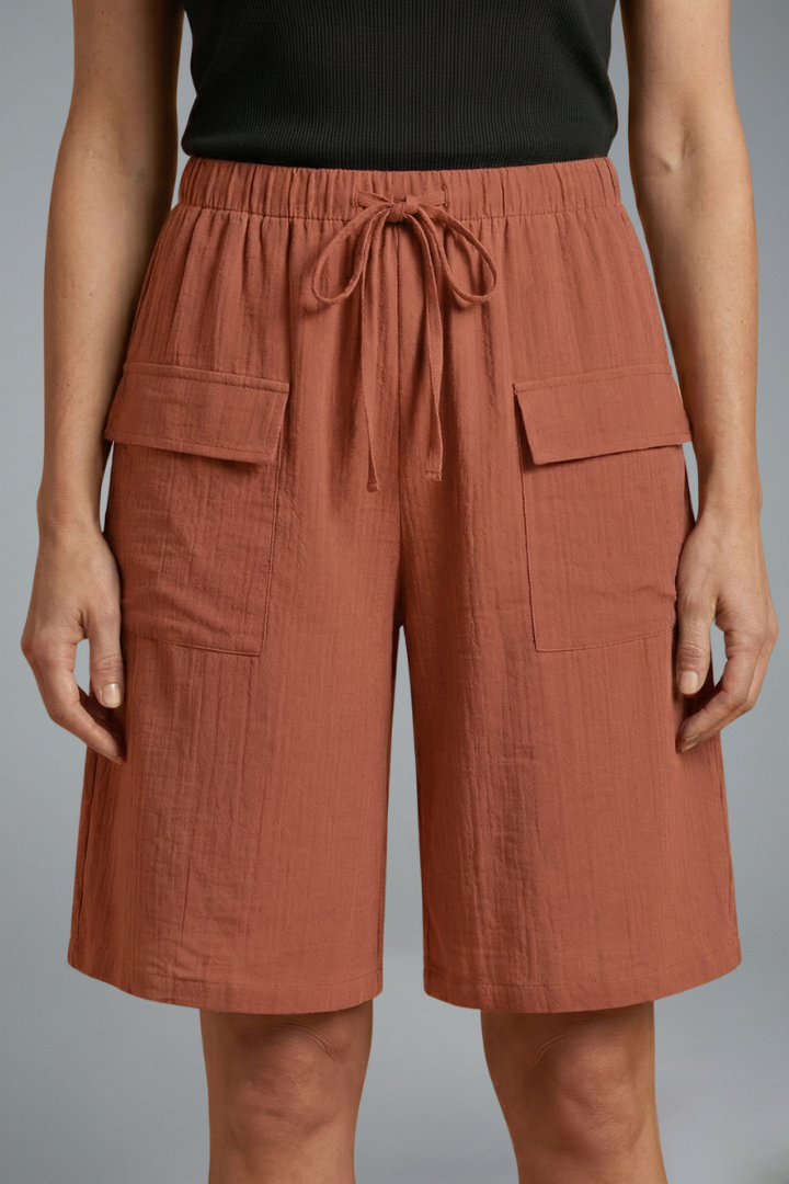 Shorts Women Crinkled Cotton Bermuda | Drawstring Waist and Flap Pockets in Orange#colour_orange