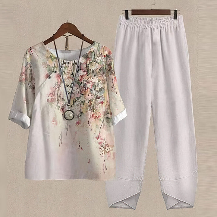 Two Piece Women Leaf Print Top | Tapered Trousers and Short Sleeves in White#colour_white